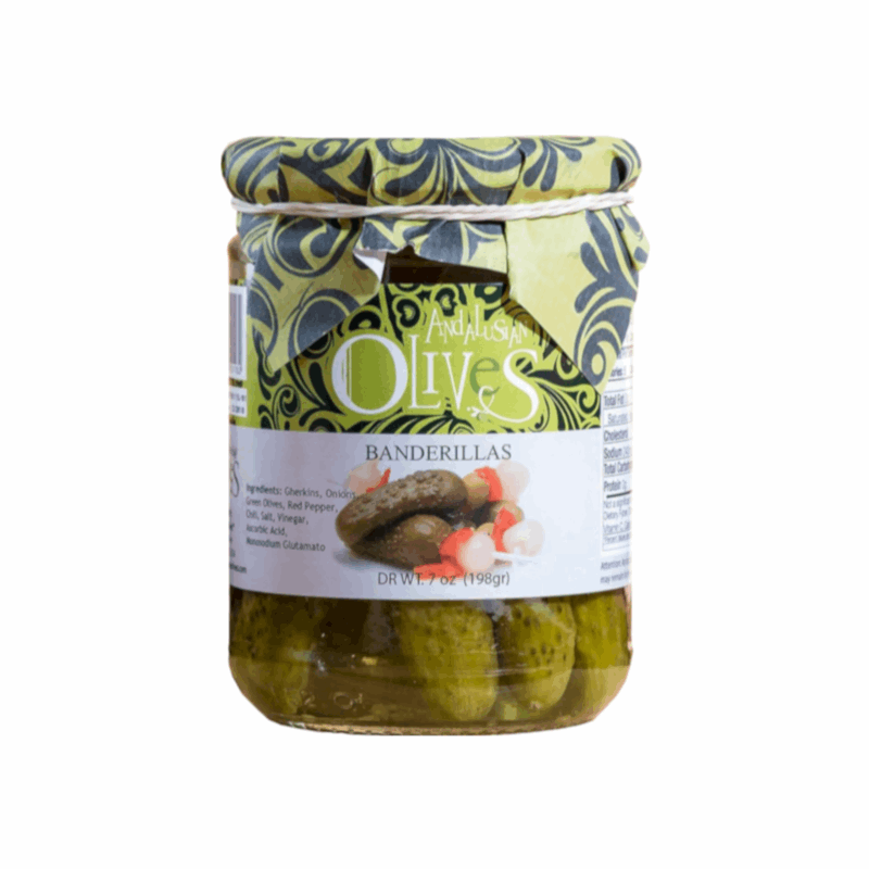 a glass jar with a label green and grey with banderillas inside