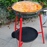 cooking a paella on a paella set