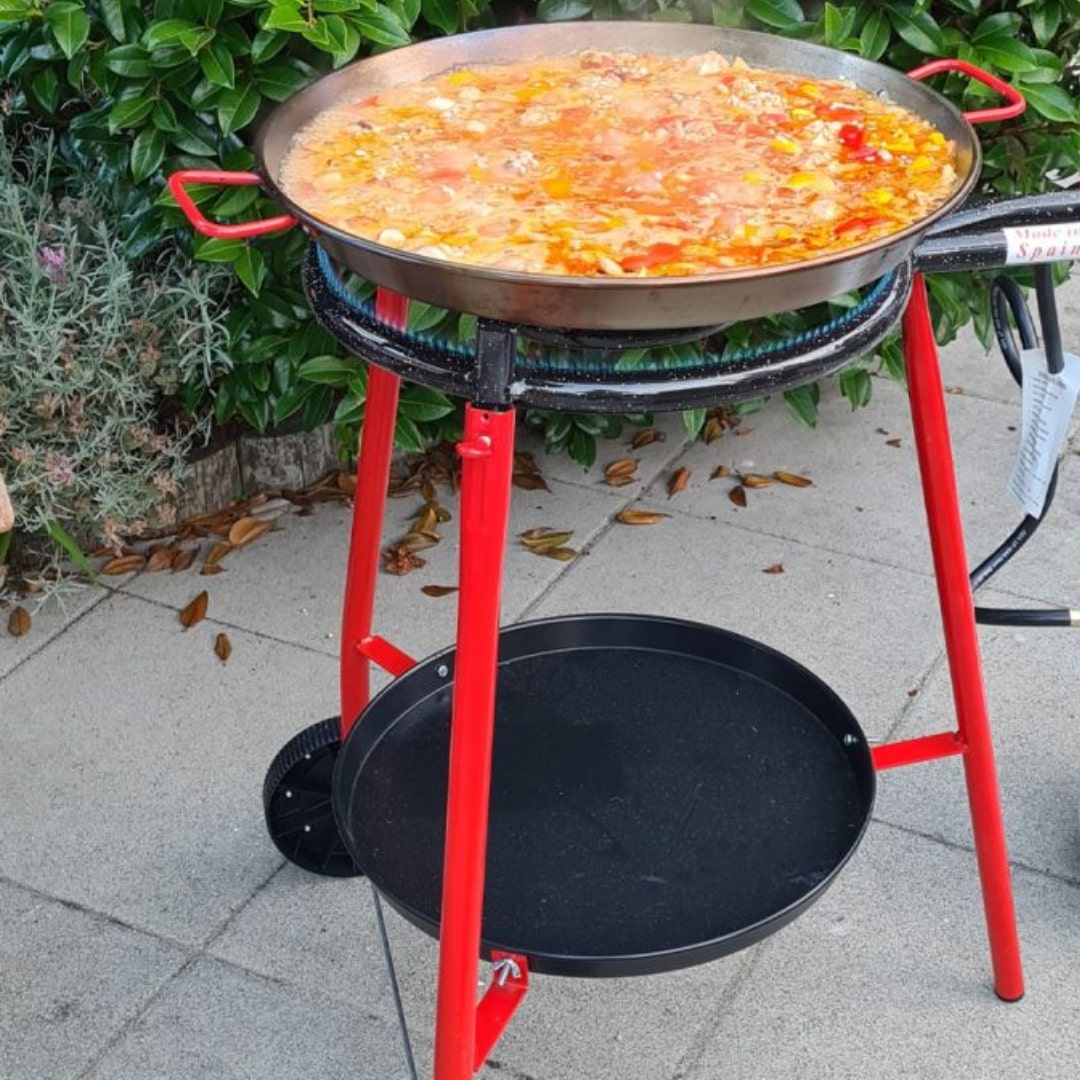 cooking a paella on a paella set
